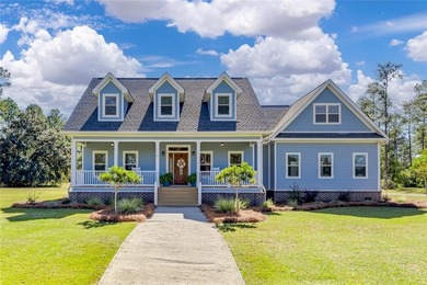 Welcome Home to 1045 Par Drive, located in the private gated on Sapelo Hammock Golf Club in Georgia - for sale on GolfHomes.com, golf home, golf lot