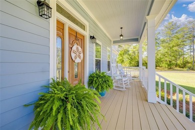 Welcome Home to 1045 Par Drive, located in the private gated on Sapelo Hammock Golf Club in Georgia - for sale on GolfHomes.com, golf home, golf lot