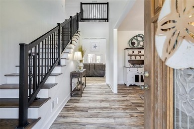 Welcome Home to 1045 Par Drive, located in the private gated on Sapelo Hammock Golf Club in Georgia - for sale on GolfHomes.com, golf home, golf lot