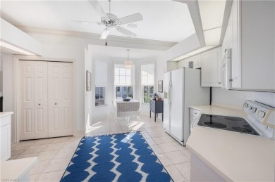 Located in the heart of Pelican Marsh this bright and sunny 2nd on Pelican Marsh Golf Club in Florida - for sale on GolfHomes.com, golf home, golf lot