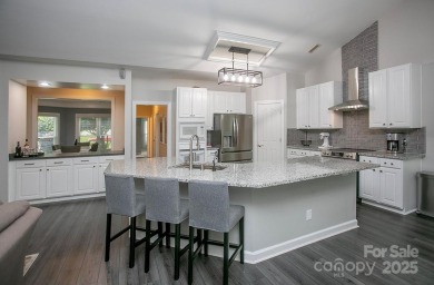 Magnificently updated ranch home built to entertain -- in the on Highland Creek Golf Club in North Carolina - for sale on GolfHomes.com, golf home, golf lot