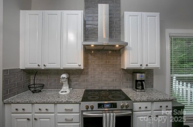 Magnificently updated ranch home built to entertain -- in the on Highland Creek Golf Club in North Carolina - for sale on GolfHomes.com, golf home, golf lot