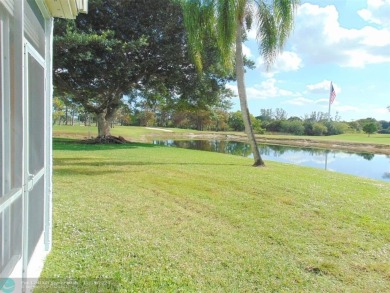 FIRST FLOOR CORNER UNIT WITH GOLF AND WATER VIEW. BEAUTIFUL on Oriole Golf and Tennis Club in Florida - for sale on GolfHomes.com, golf home, golf lot