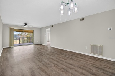 Discover carefree living in the vibrant 55+ community of Green on Tarpon Springs Golf Course in Florida - for sale on GolfHomes.com, golf home, golf lot