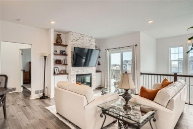 Nestled atop a corner lot, this beautiful sunlit property is on Southern Hills Golf Club in Minnesota - for sale on GolfHomes.com, golf home, golf lot