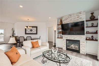 Nestled atop a corner lot, this beautiful sunlit property is on Southern Hills Golf Club in Minnesota - for sale on GolfHomes.com, golf home, golf lot