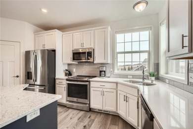 Nestled atop a corner lot, this beautiful sunlit property is on Southern Hills Golf Club in Minnesota - for sale on GolfHomes.com, golf home, golf lot