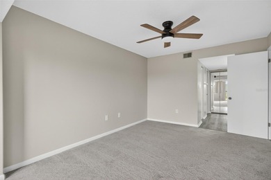 Discover carefree living in the vibrant 55+ community of Green on Tarpon Springs Golf Course in Florida - for sale on GolfHomes.com, golf home, golf lot