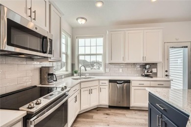 Nestled atop a corner lot, this beautiful sunlit property is on Southern Hills Golf Club in Minnesota - for sale on GolfHomes.com, golf home, golf lot