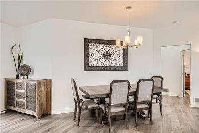 Nestled atop a corner lot, this beautiful sunlit property is on Southern Hills Golf Club in Minnesota - for sale on GolfHomes.com, golf home, golf lot