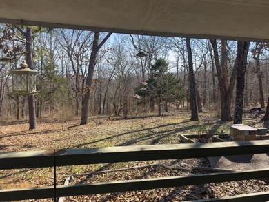 Priced to Sell! Discover the perfect blend of space and location on Cherokee Village North Course in Arkansas - for sale on GolfHomes.com, golf home, golf lot