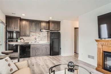 Nestled atop a corner lot, this beautiful sunlit property is on Southern Hills Golf Club in Minnesota - for sale on GolfHomes.com, golf home, golf lot