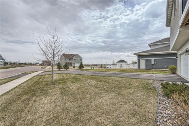 Nestled atop a corner lot, this beautiful sunlit property is on Southern Hills Golf Club in Minnesota - for sale on GolfHomes.com, golf home, golf lot