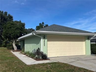 Enjoy the Florida country club lifestyle in this affordable and on Cypresswood Golf and Country Club in Florida - for sale on GolfHomes.com, golf home, golf lot