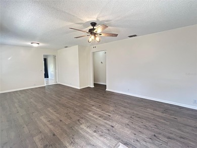 Enjoy the Florida country club lifestyle in this affordable and on Cypresswood Golf and Country Club in Florida - for sale on GolfHomes.com, golf home, golf lot