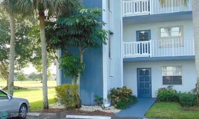 FIRST FLOOR CORNER UNIT WITH GOLF AND WATER VIEW. BEAUTIFUL on Oriole Golf and Tennis Club in Florida - for sale on GolfHomes.com, golf home, golf lot