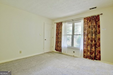 This is your opportunity to live in the heart of Peachtree City on Braelinn Golf Club in Georgia - for sale on GolfHomes.com, golf home, golf lot