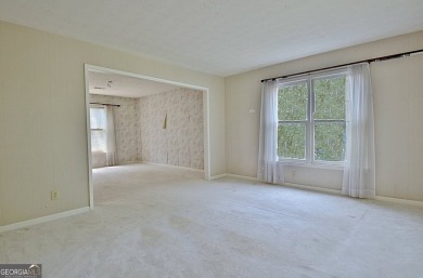 This is your opportunity to live in the heart of Peachtree City on Braelinn Golf Club in Georgia - for sale on GolfHomes.com, golf home, golf lot