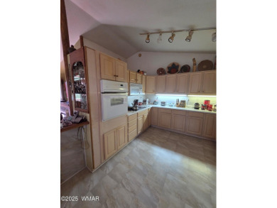 Step inside this pristine and updated single family home in the on Bison Golf and Country Club in Arizona - for sale on GolfHomes.com, golf home, golf lot