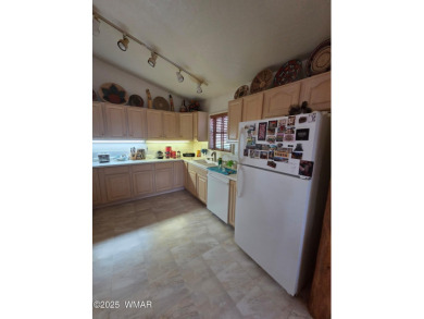 Step inside this pristine and updated single family home in the on Bison Golf and Country Club in Arizona - for sale on GolfHomes.com, golf home, golf lot