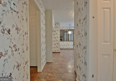 This is your opportunity to live in the heart of Peachtree City on Braelinn Golf Club in Georgia - for sale on GolfHomes.com, golf home, golf lot