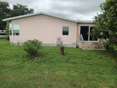 OR BEST OFFER!! **STUNNING TRIPLE WIDE ON AN AMAZING LOT!! This on Spanish Lakes Fairways in Florida - for sale on GolfHomes.com, golf home, golf lot