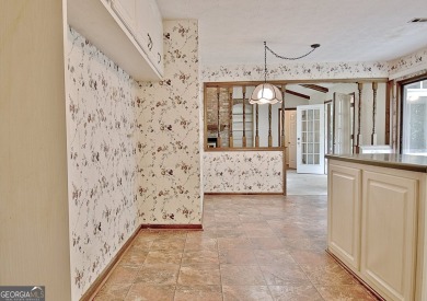 This is your opportunity to live in the heart of Peachtree City on Braelinn Golf Club in Georgia - for sale on GolfHomes.com, golf home, golf lot