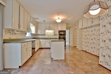 This is your opportunity to live in the heart of Peachtree City on Braelinn Golf Club in Georgia - for sale on GolfHomes.com, golf home, golf lot