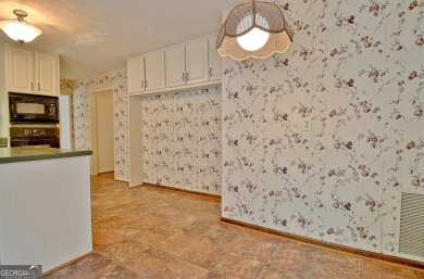 This is your opportunity to live in the heart of Peachtree City on Braelinn Golf Club in Georgia - for sale on GolfHomes.com, golf home, golf lot