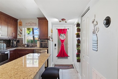 Wake up every day to lush golf course views in this beautifully on Sunrise Lakes Phase IV Golf Course in Florida - for sale on GolfHomes.com, golf home, golf lot