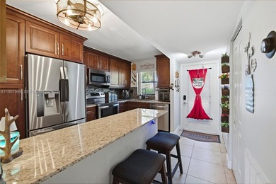 Wake up every day to lush golf course views in this beautifully on Sunrise Lakes Phase IV Golf Course in Florida - for sale on GolfHomes.com, golf home, golf lot