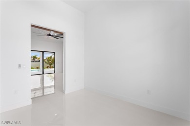 Experience REFINED LIVING in this MODERN LUXURY RESIDENCE in on Palmetto-Pine Country Club in Florida - for sale on GolfHomes.com, golf home, golf lot