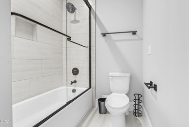 Welcome to this exquisite ICG-built home, completed in 2023 and on Chapel Ridge Golf Club in North Carolina - for sale on GolfHomes.com, golf home, golf lot