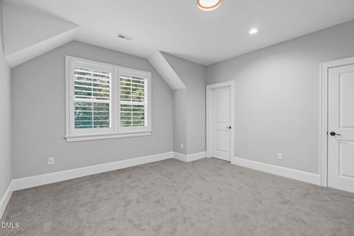 Welcome to this exquisite ICG-built home, completed in 2023 and on Chapel Ridge Golf Club in North Carolina - for sale on GolfHomes.com, golf home, golf lot