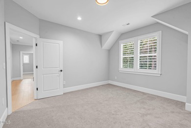 Welcome to this exquisite ICG-built home, completed in 2023 and on Chapel Ridge Golf Club in North Carolina - for sale on GolfHomes.com, golf home, golf lot