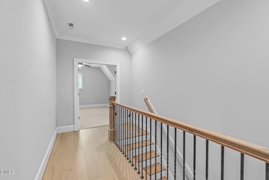 Welcome to this exquisite ICG-built home, completed in 2023 and on Chapel Ridge Golf Club in North Carolina - for sale on GolfHomes.com, golf home, golf lot