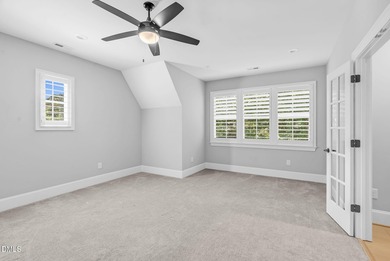 Welcome to this exquisite ICG-built home, completed in 2023 and on Chapel Ridge Golf Club in North Carolina - for sale on GolfHomes.com, golf home, golf lot