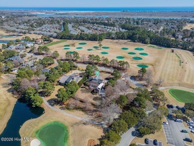 Perfectly situated on the Nicklaus #9 green with tranquil pond on Country Club of Landfall in North Carolina - for sale on GolfHomes.com, golf home, golf lot