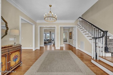 Perfectly situated on the Nicklaus #9 green with tranquil pond on Country Club of Landfall in North Carolina - for sale on GolfHomes.com, golf home, golf lot