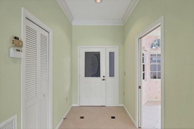 Privacy is delivered in this 2 bedroom, 2 bathroom villa on The Meadows Golf and Country Club in Florida - for sale on GolfHomes.com, golf home, golf lot
