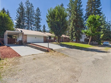 Spacious 3/2 single-level brick home very close to Pinehurst on The Pinehurst Golf Course in Idaho - for sale on GolfHomes.com, golf home, golf lot