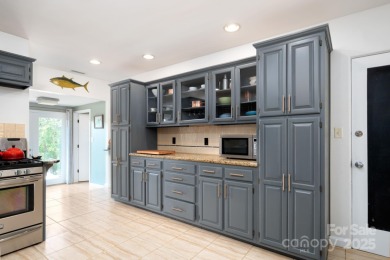 Incredible North Asheville location with Beaver Lake views in on Country Club of Asheville in North Carolina - for sale on GolfHomes.com, golf home, golf lot