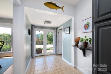 Incredible North Asheville location with Beaver Lake views in on Country Club of Asheville in North Carolina - for sale on GolfHomes.com, golf home, golf lot