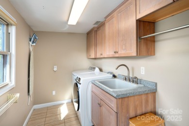 Incredible North Asheville location with Beaver Lake views in on Country Club of Asheville in North Carolina - for sale on GolfHomes.com, golf home, golf lot