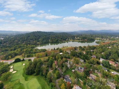 Incredible North Asheville location with Beaver Lake views in on Country Club of Asheville in North Carolina - for sale on GolfHomes.com, golf home, golf lot