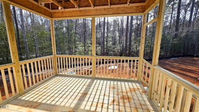 Custom-Built True Ranch by Ken Harvey Homes in Lake Royale-a on River Golf and Country Club at Lake Royale in North Carolina - for sale on GolfHomes.com, golf home, golf lot