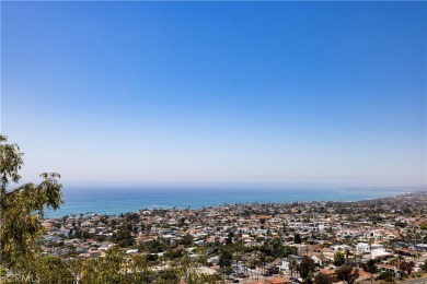 An elevated coastal sanctuary set atop a commanding bluff in on San Clemente Municipal Golf Course in California - for sale on GolfHomes.com, golf home, golf lot