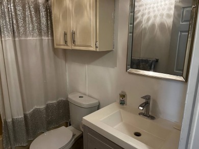 Community living in a great location with tons of activities in on Lake Henry Golf Club in Florida - for sale on GolfHomes.com, golf home, golf lot