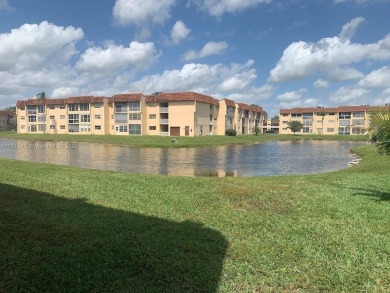 Beautiful 2 bedroom, 2 bath luxury condo with a scenic lake view on Sunrise Lakes Phase III in Florida - for sale on GolfHomes.com, golf home, golf lot