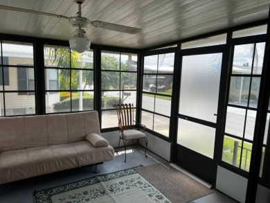 Community living in a great location with tons of activities in on Lake Henry Golf Club in Florida - for sale on GolfHomes.com, golf home, golf lot